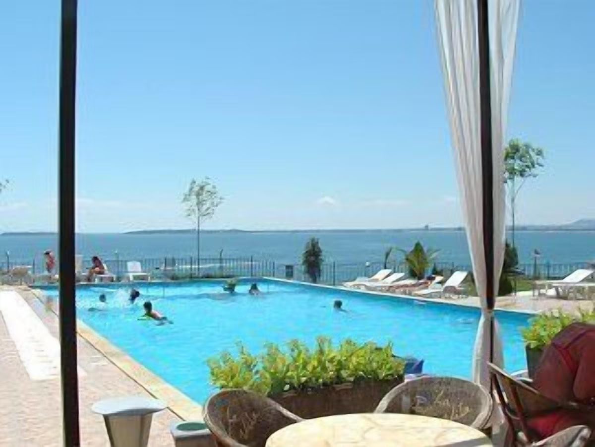 Swimming pool in the complex overlooking the sea